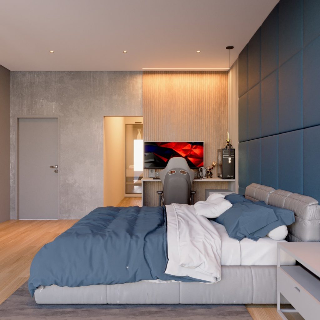 Suíte jovem com painel azul estofado e home office