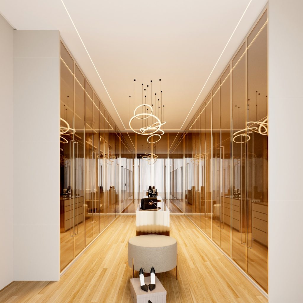 Closet planejado com portas espelhadas e iluminação linear
